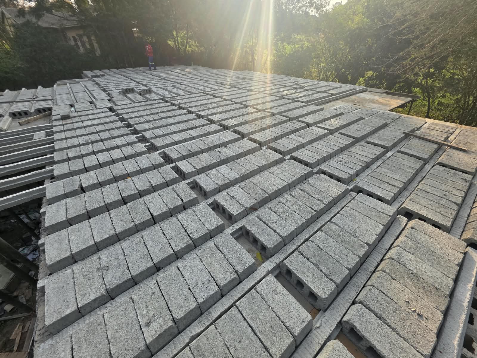 Cement blocks laid out across a slab ready for building