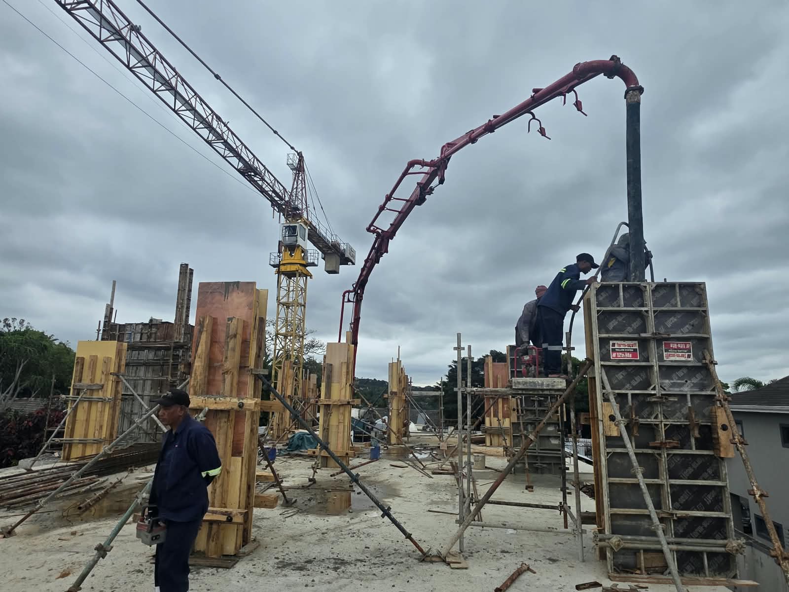 Column formwork being pumped with concrete